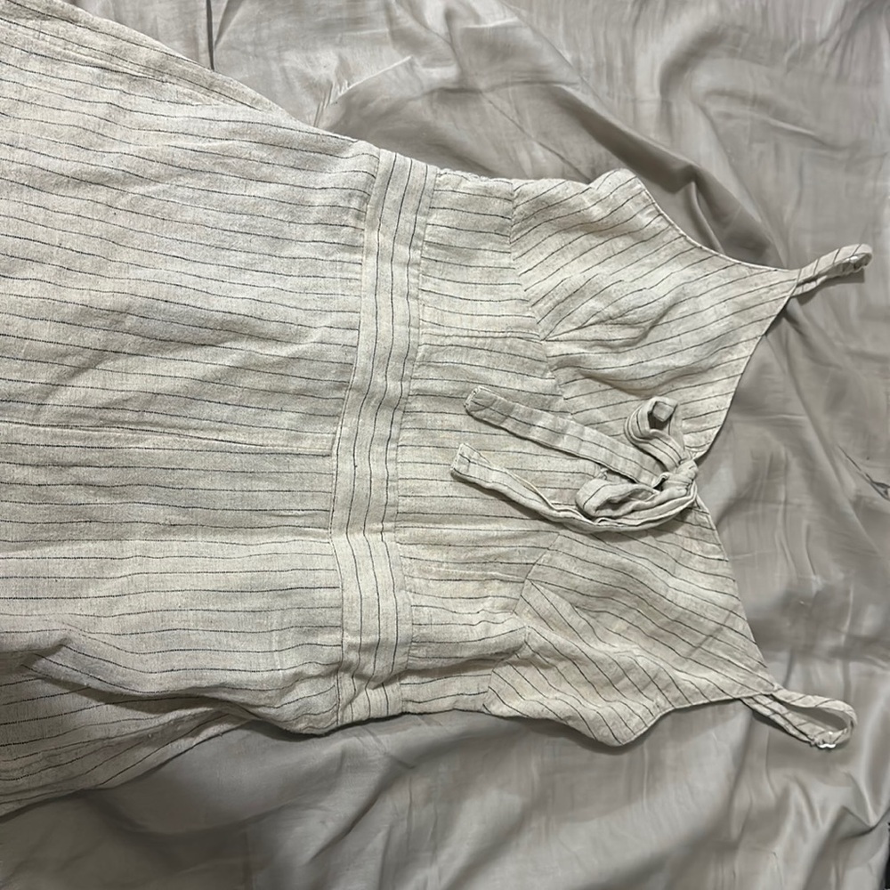 Jessica Simpson romper beige with black stripes. Size small